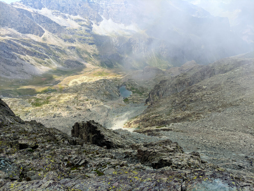 Vista del Lac Porcieroles sul versante francese visto dalla discesa della normale alla Punta Udine